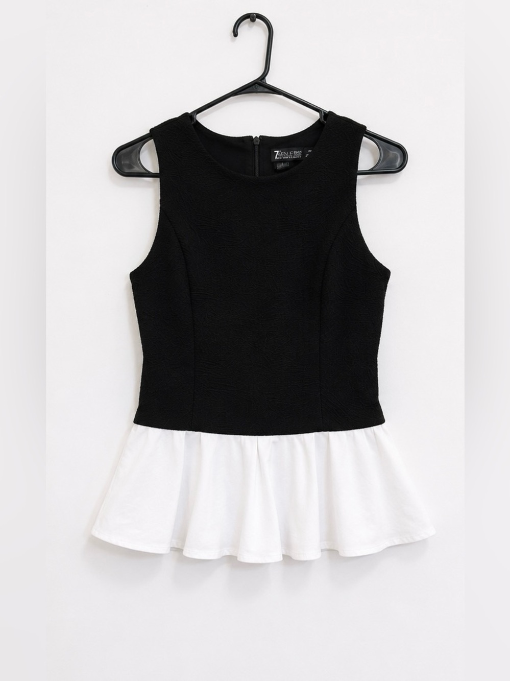 Black Sleeveless Peplum Top with White Hem
